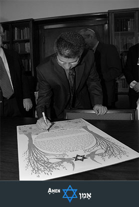 Male Witness Signing The Ketubah